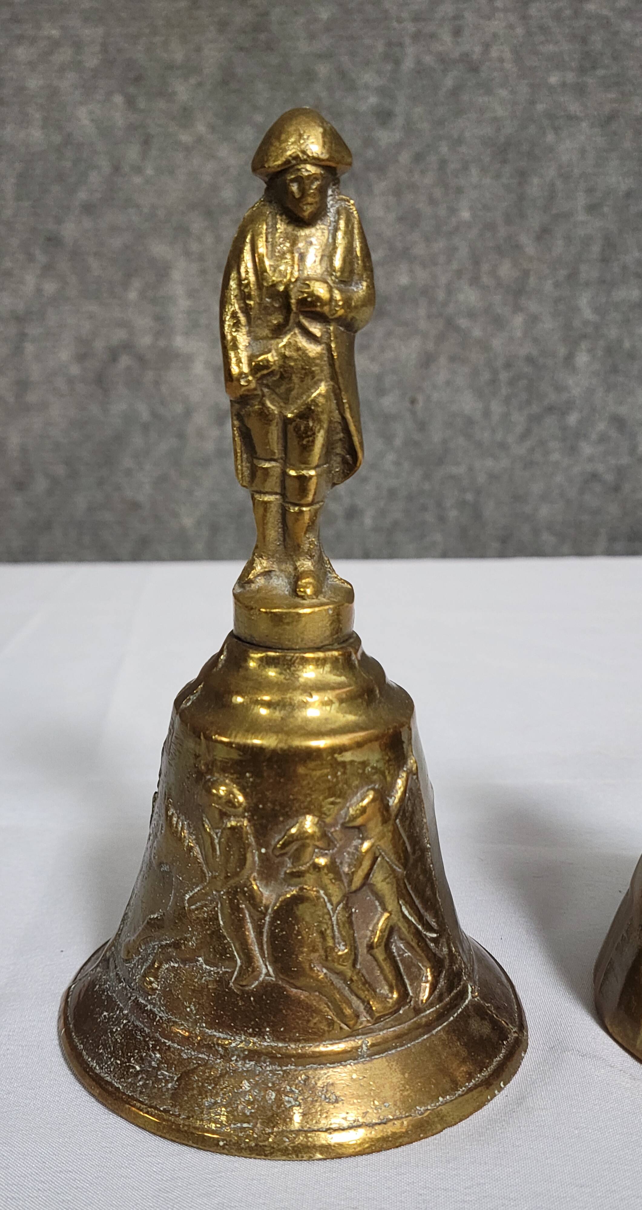 Two vintage bronze table cloches, finely chiseled and gilded