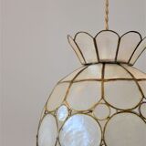 Small suspension in mother-of-pearl and brass flower shape -