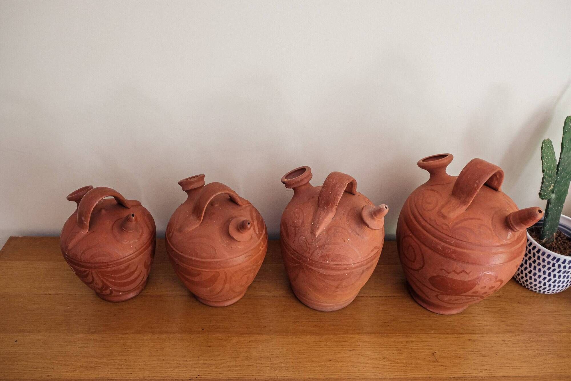 Set of 4 terracotta jugs