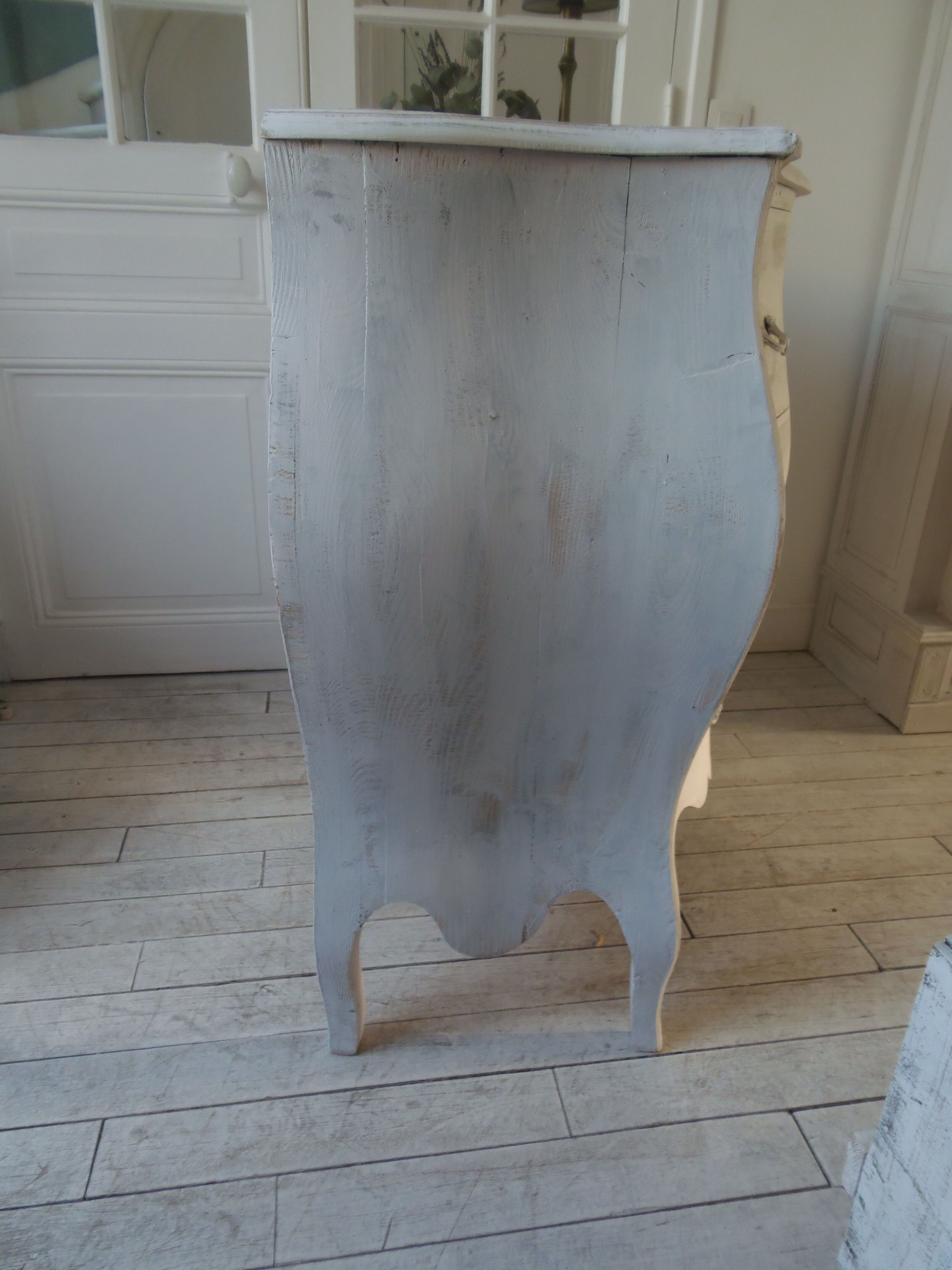 Curved patinated chest of drawers pearl grey waxed finish