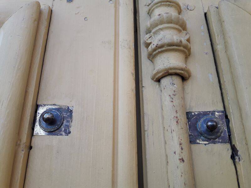 19th century double arched entrance door in oak with grilles and old glass