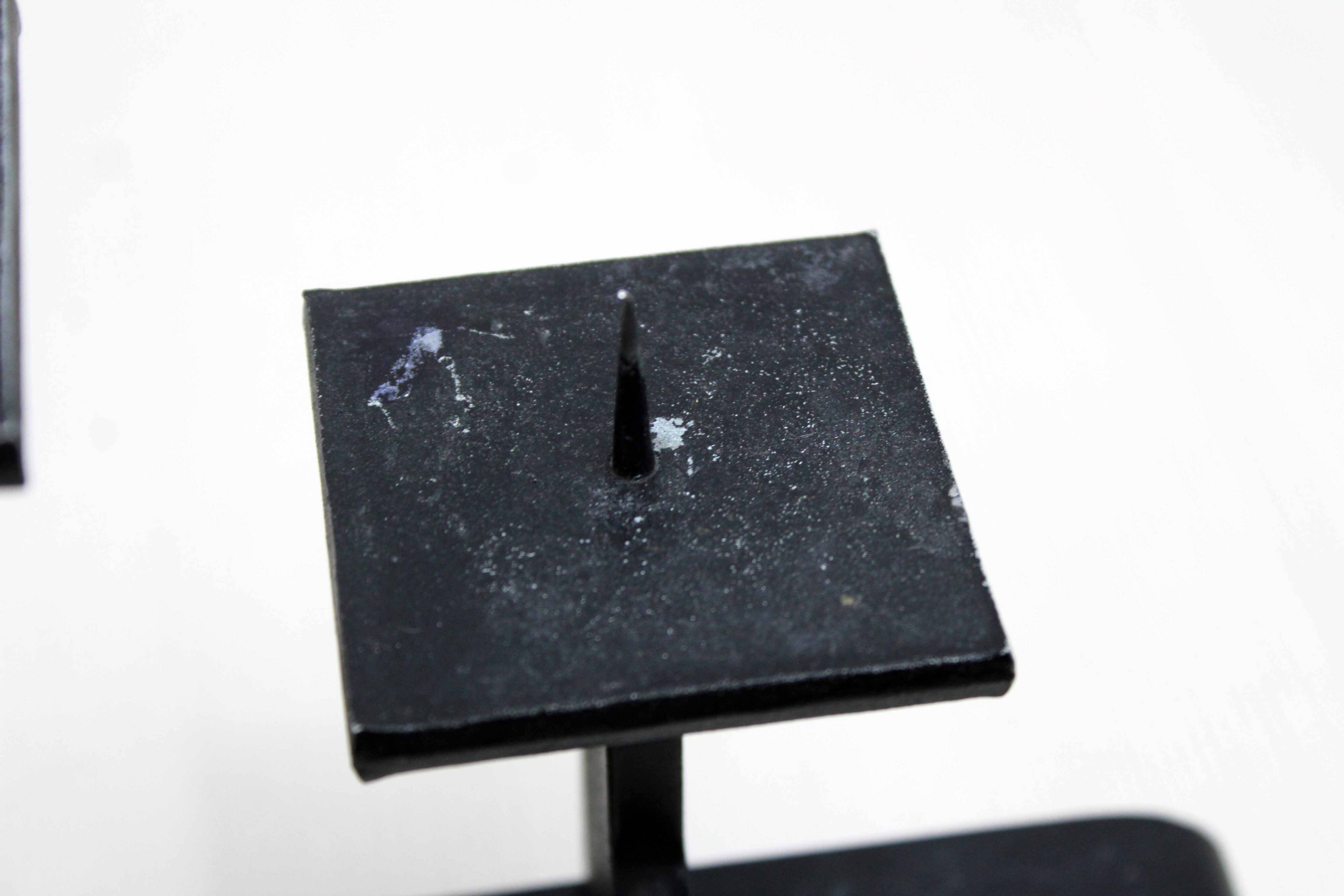 Modernist cast iron candle holder