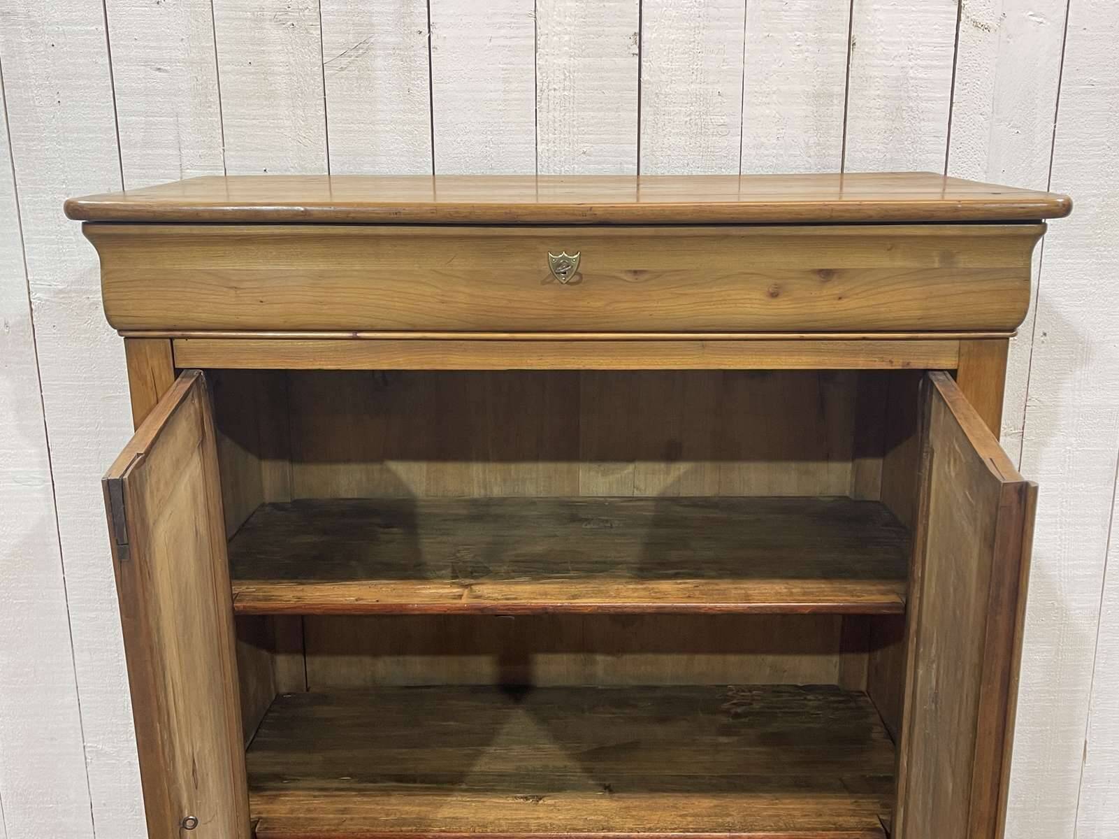 Small Louis Philippe 19th century cherry wood wardrobe with a drawer at the top