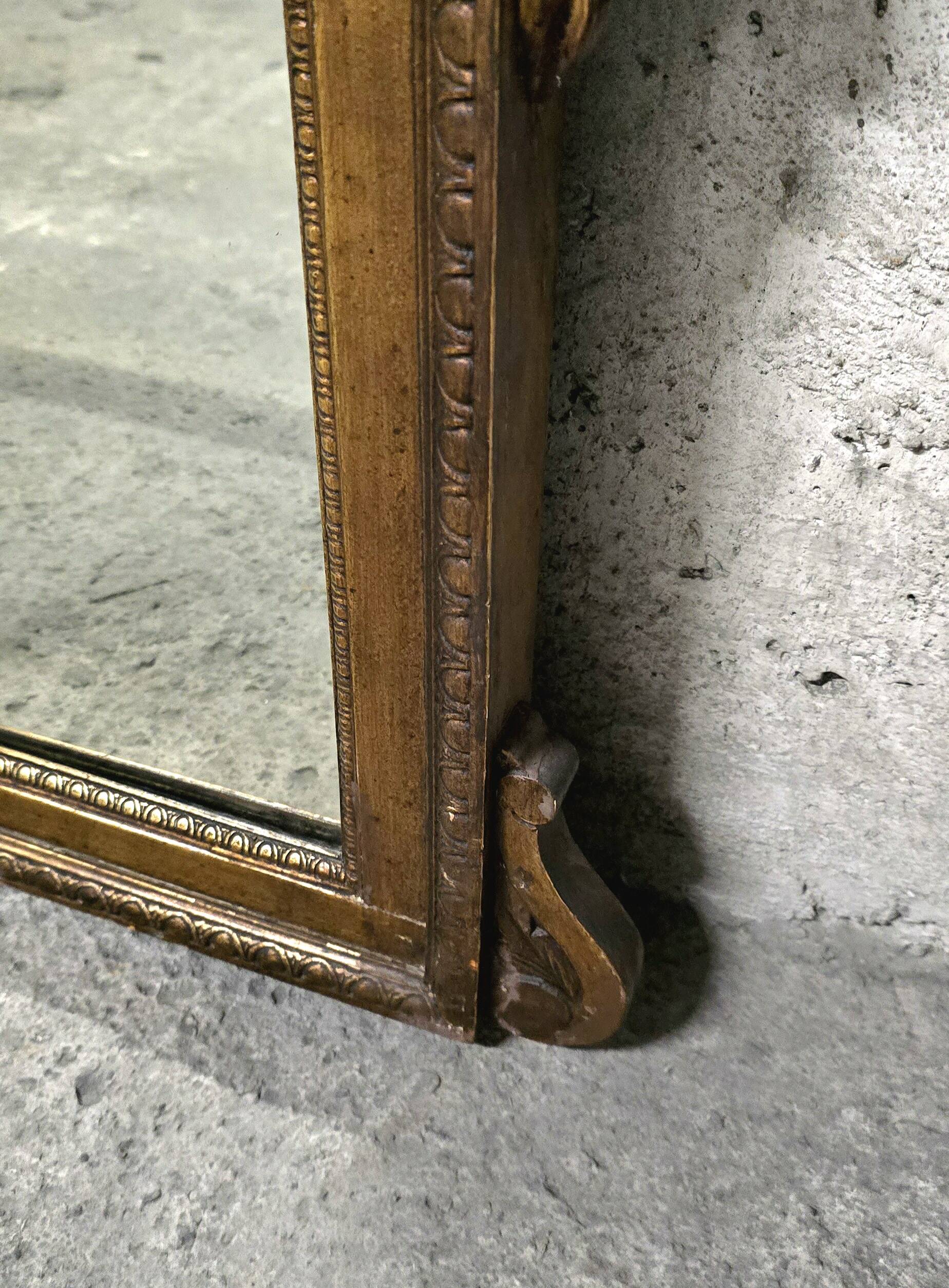 Wood and stucco fireplace mirror, late 19th-early 20th century