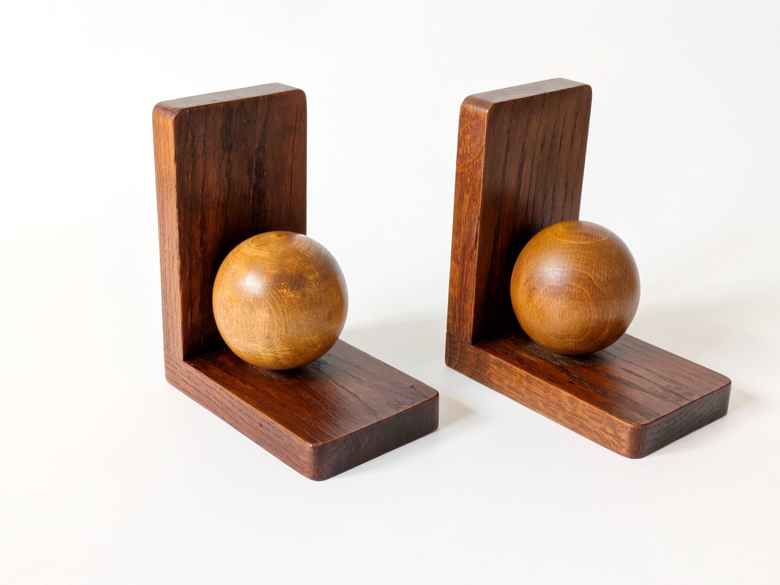 Pair of antique oak ball bookends, Midcentury Art Deco