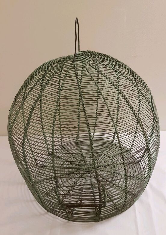 Spherical bird cage green metal