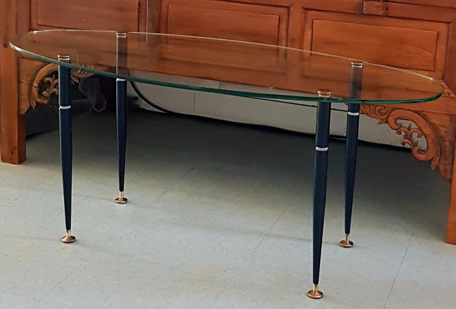 1950 oval coffee table in steel and brass glass