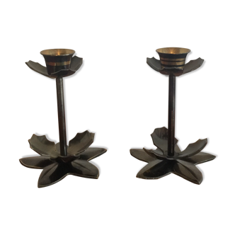 Pair of candlestick on brass feet