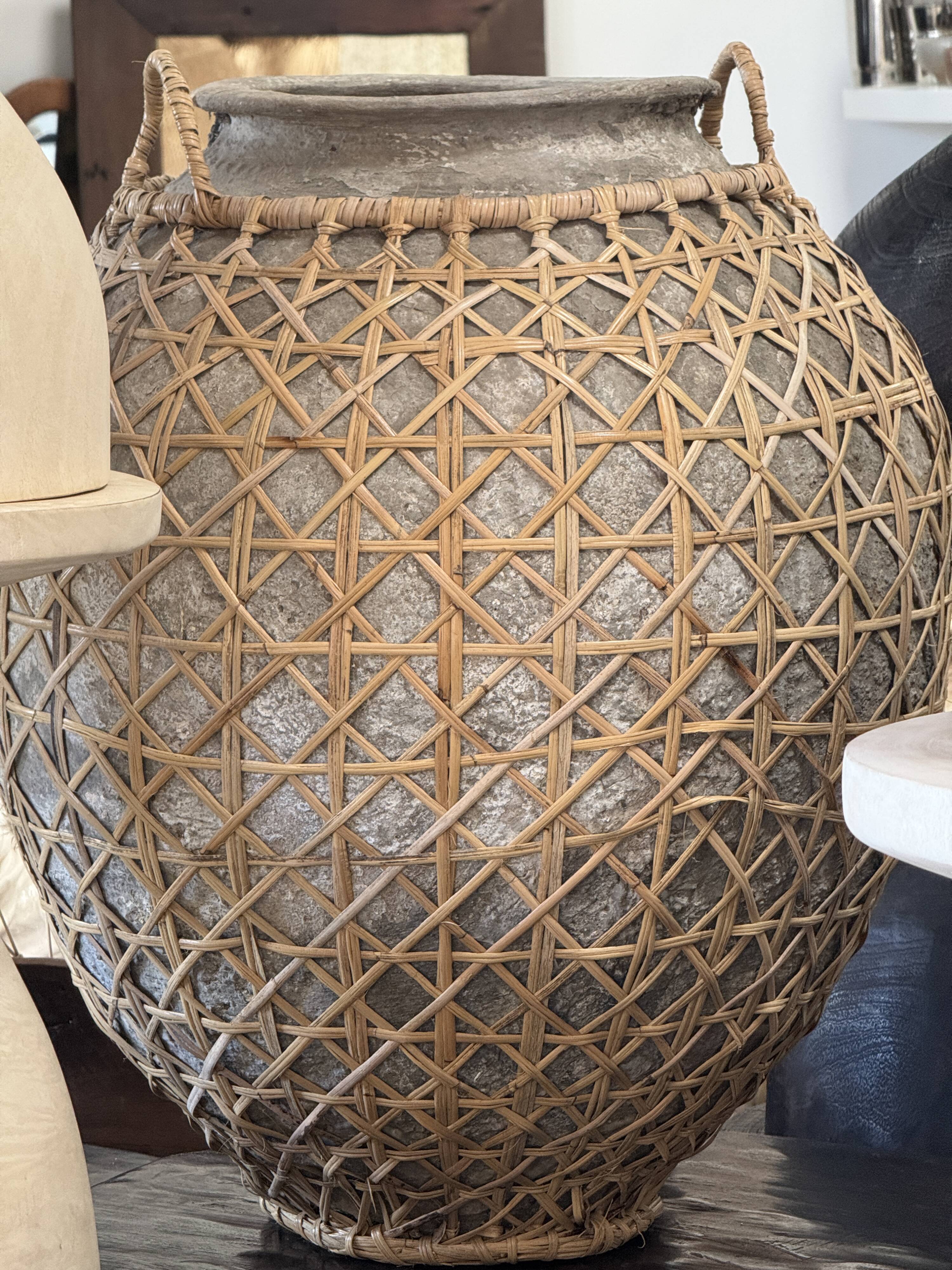 Immense light grey antique-style pot with a crosshatch lid and handles.