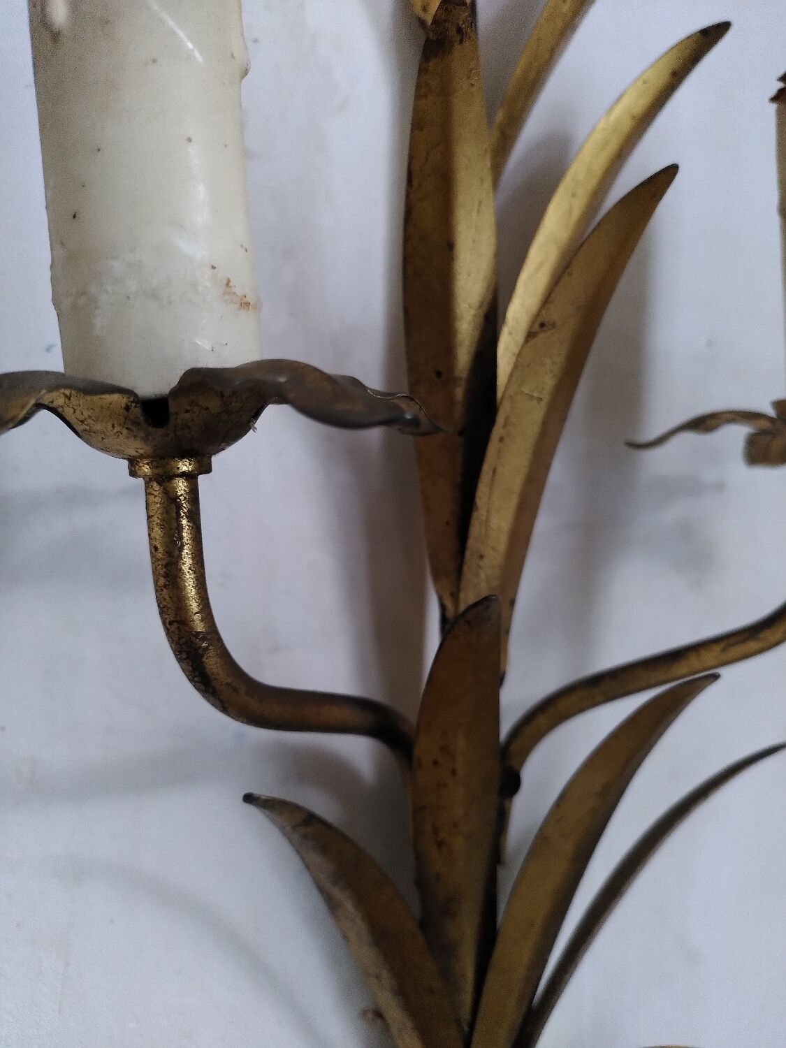 Pair of gold metal leaf wall sconces