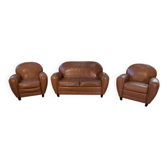 Set of 2 camel faux leather club chairs from the 1980s.