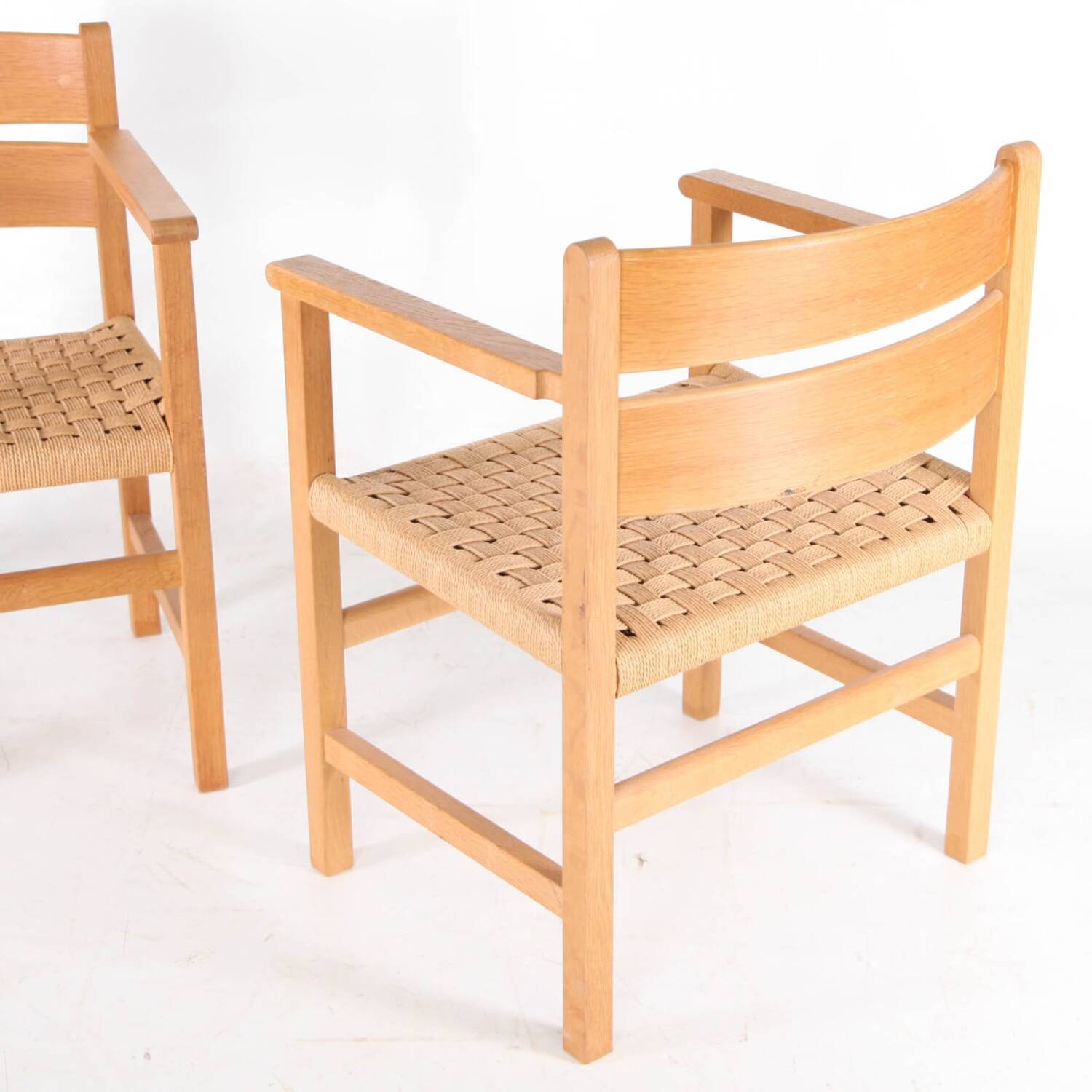 Pair of wooden and rope armchairs