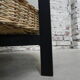 Vintage coffee table with glass top and rattan basket