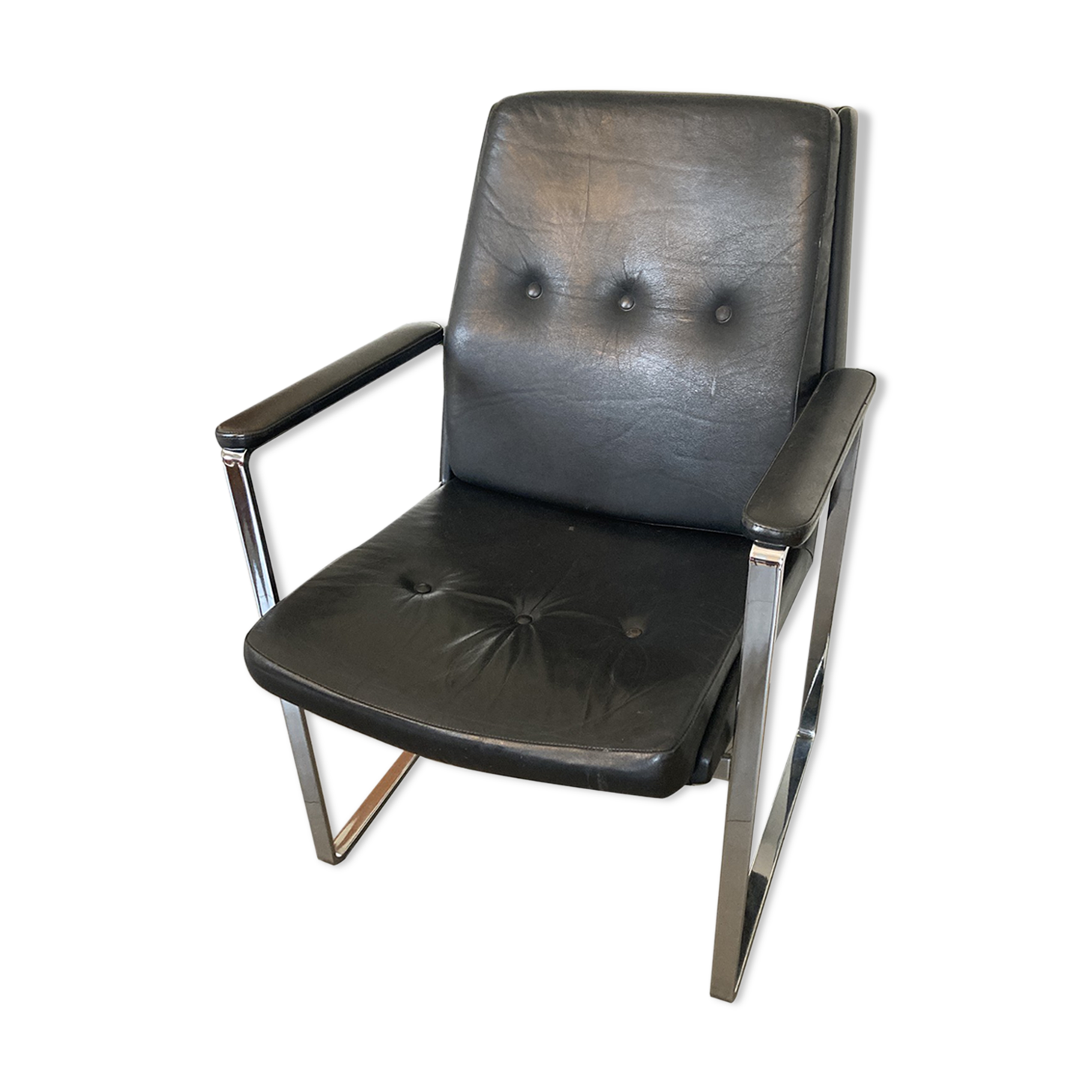 Armchair, office chair. Leather and chrome-plated steel. 1980