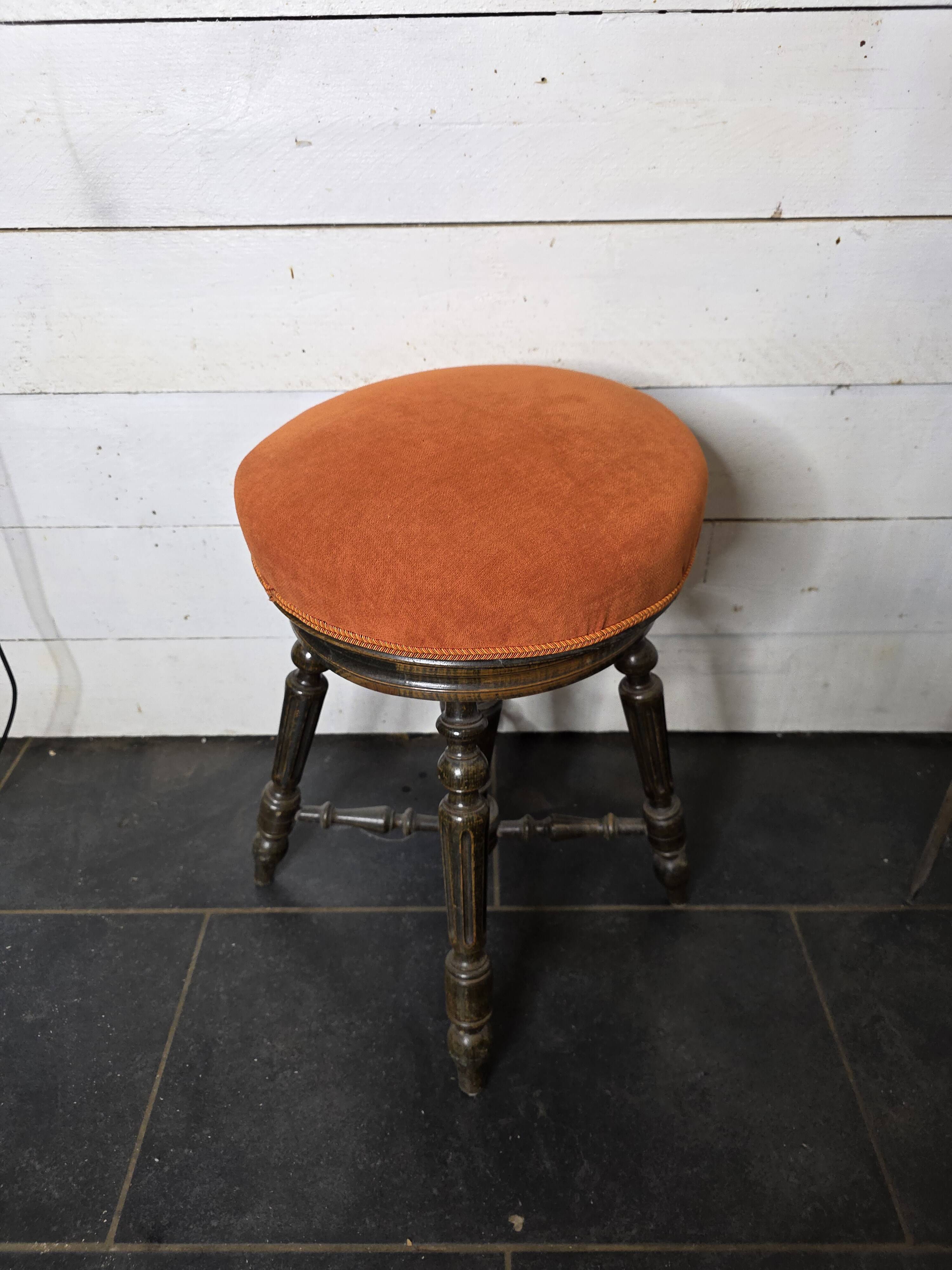 Antique adjustable piano stool