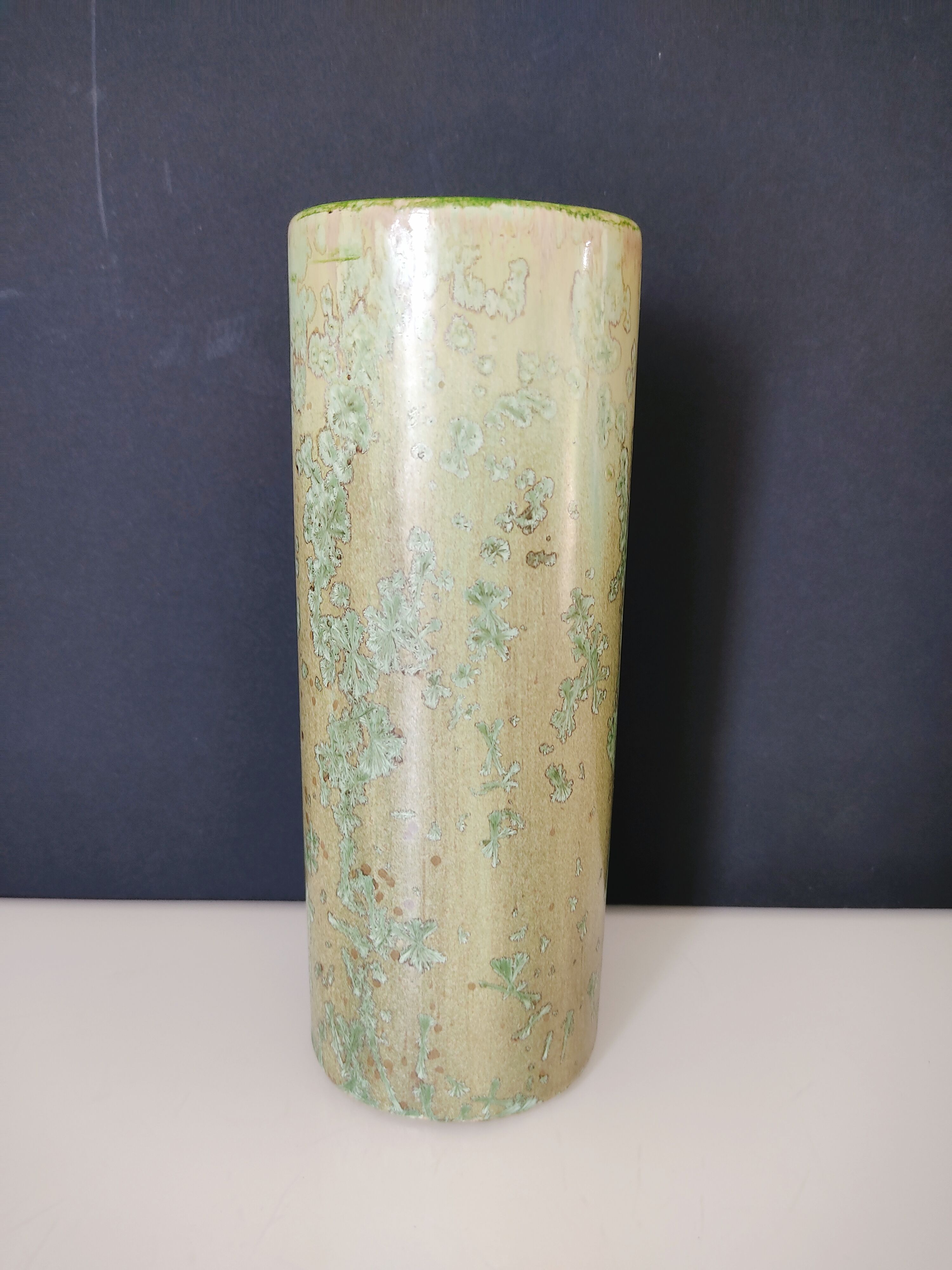Pale green ceramic roller vase