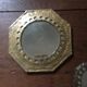 Ethnic brass mirrors.