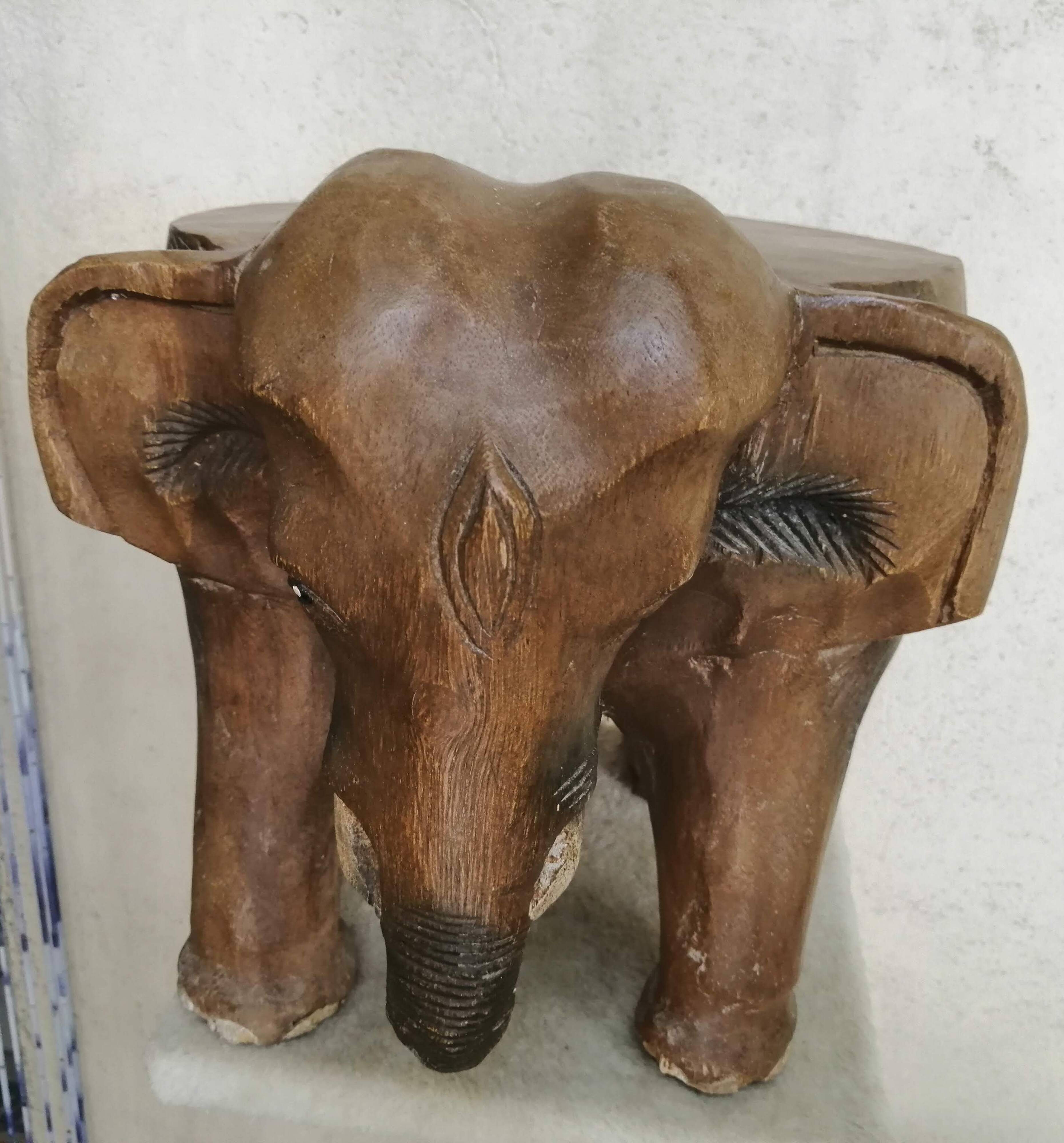 Solid wooden elephant table