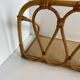Rattan wall shelf