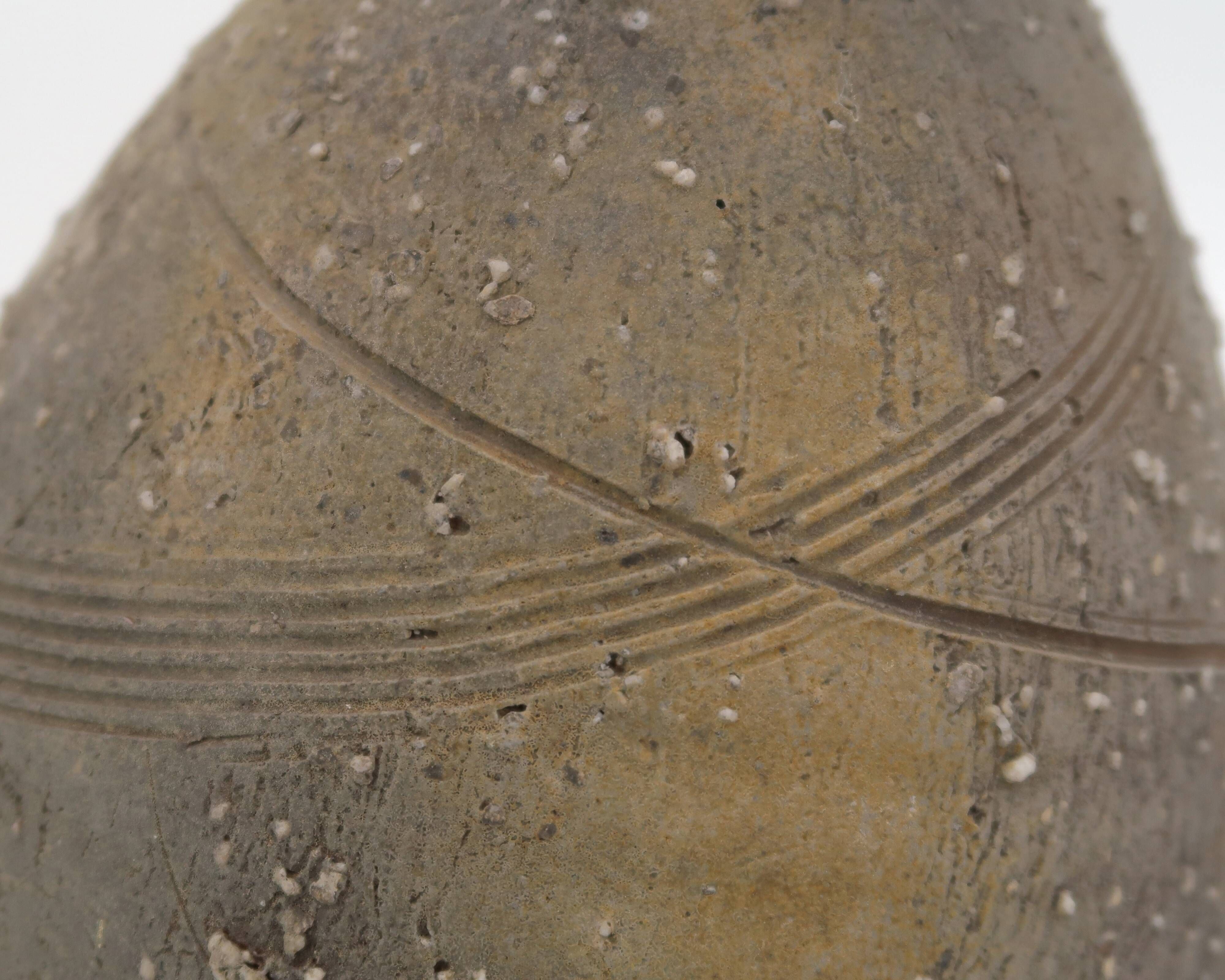 Sandstone sculpture by Eric Astoul, ceramic wood-fired kiln.