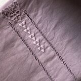 Old linen tablecloth tinted in lilac