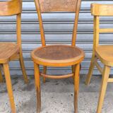 Set of four mismatched bistro chairs