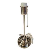 Modern white nickel lamp base with pull switch.
