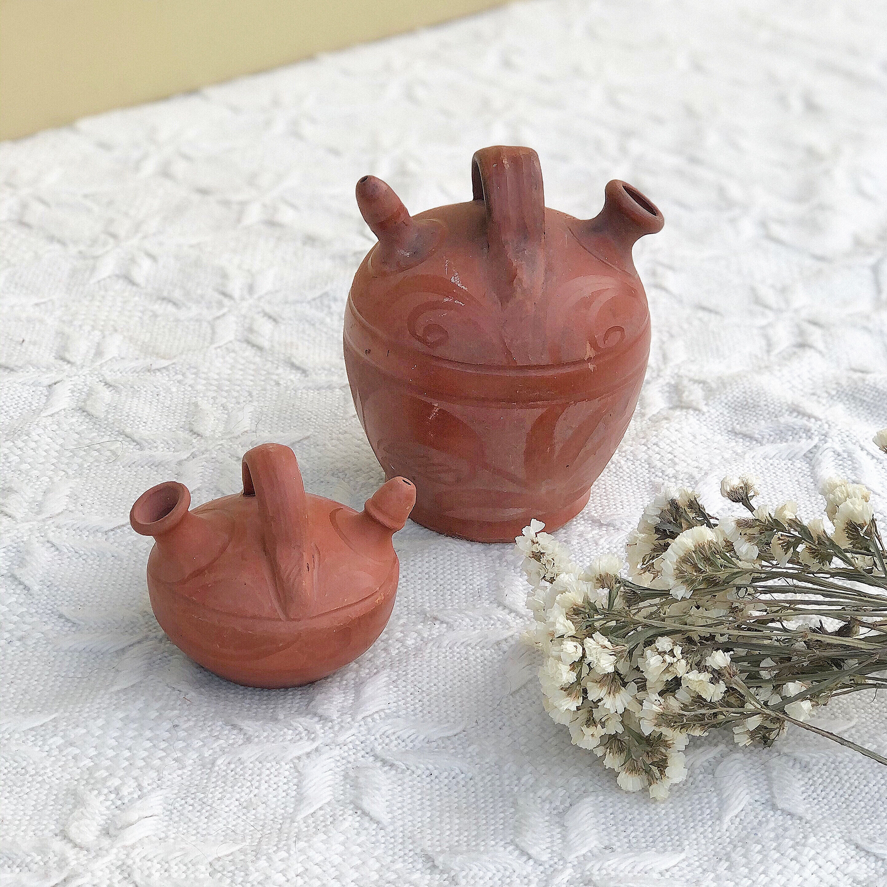 Two terracotta gargoyles