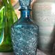 Vintage blue glass whiskey decanter