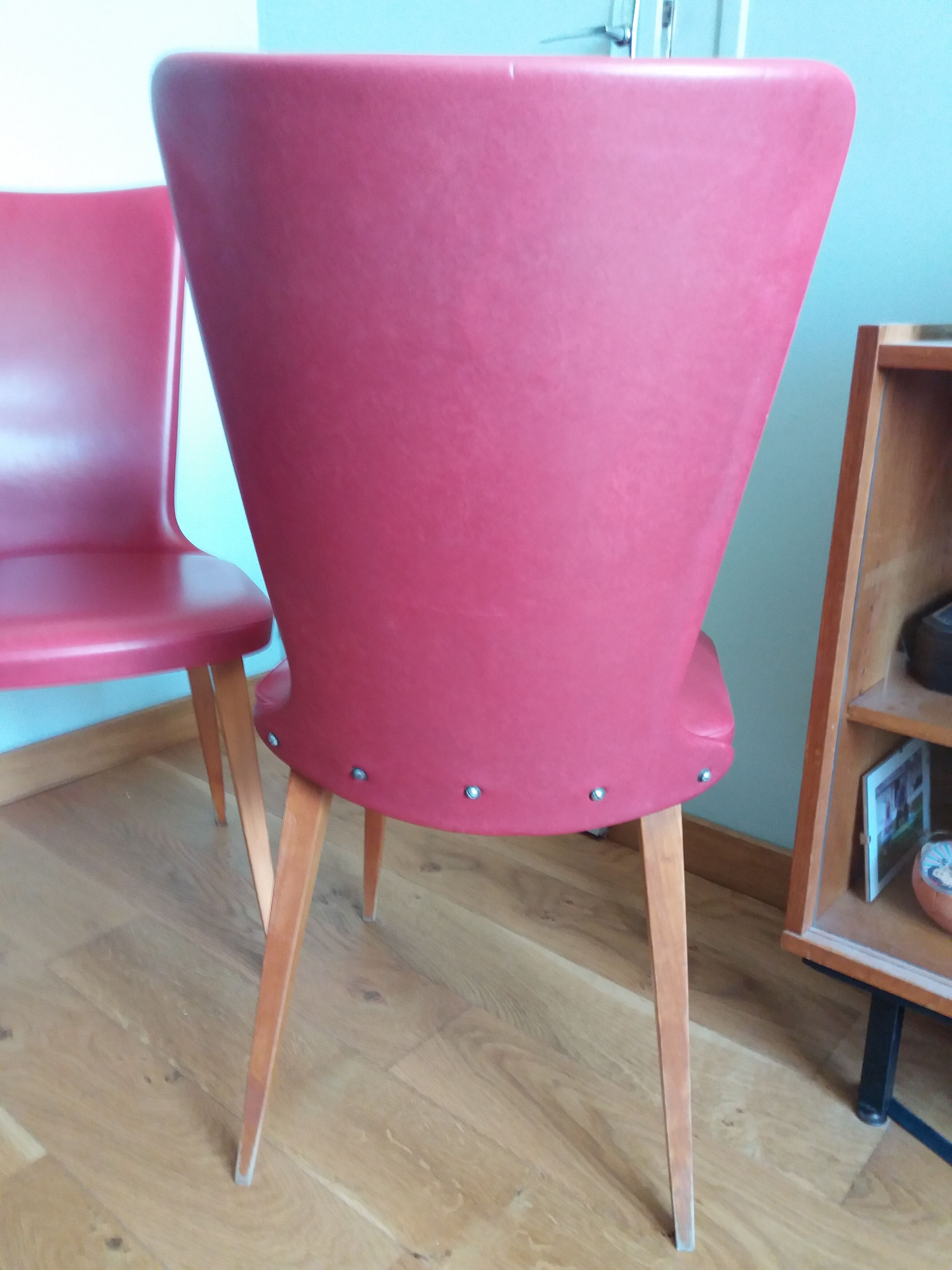 Baumann skai red imitation leather chairs from the 1950s