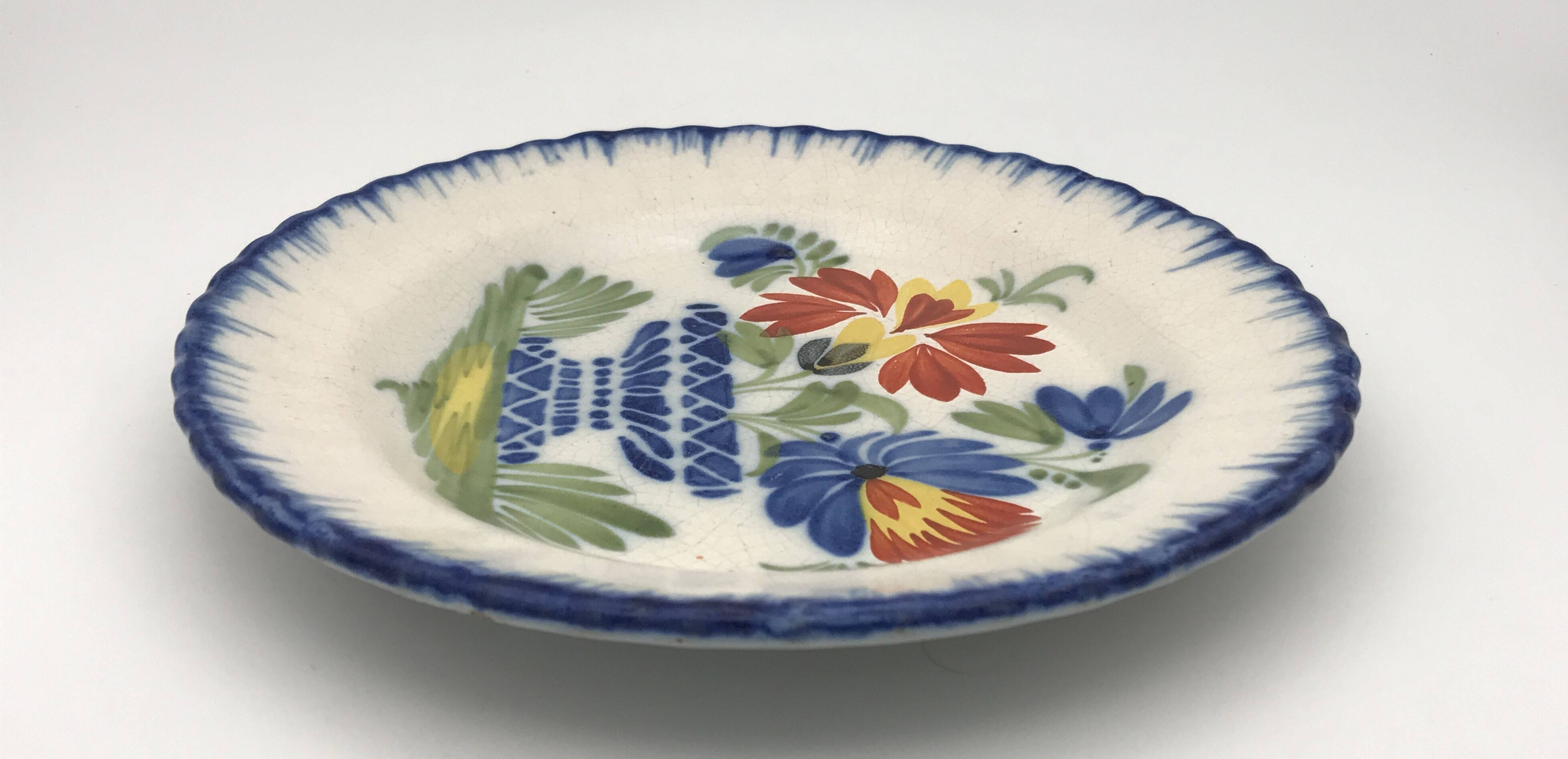 Antique auvillar earthenware plate decorated with basket of polychrome flowers