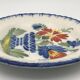 Assiette ancienne en faïence d’auvillar à décor de corbeille de fleurs polychrome
