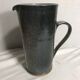 Enamelled ceramic pitcher, 70s, in blue gray