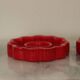 Pair of red Swedish candle holders designed by Gustavsberg