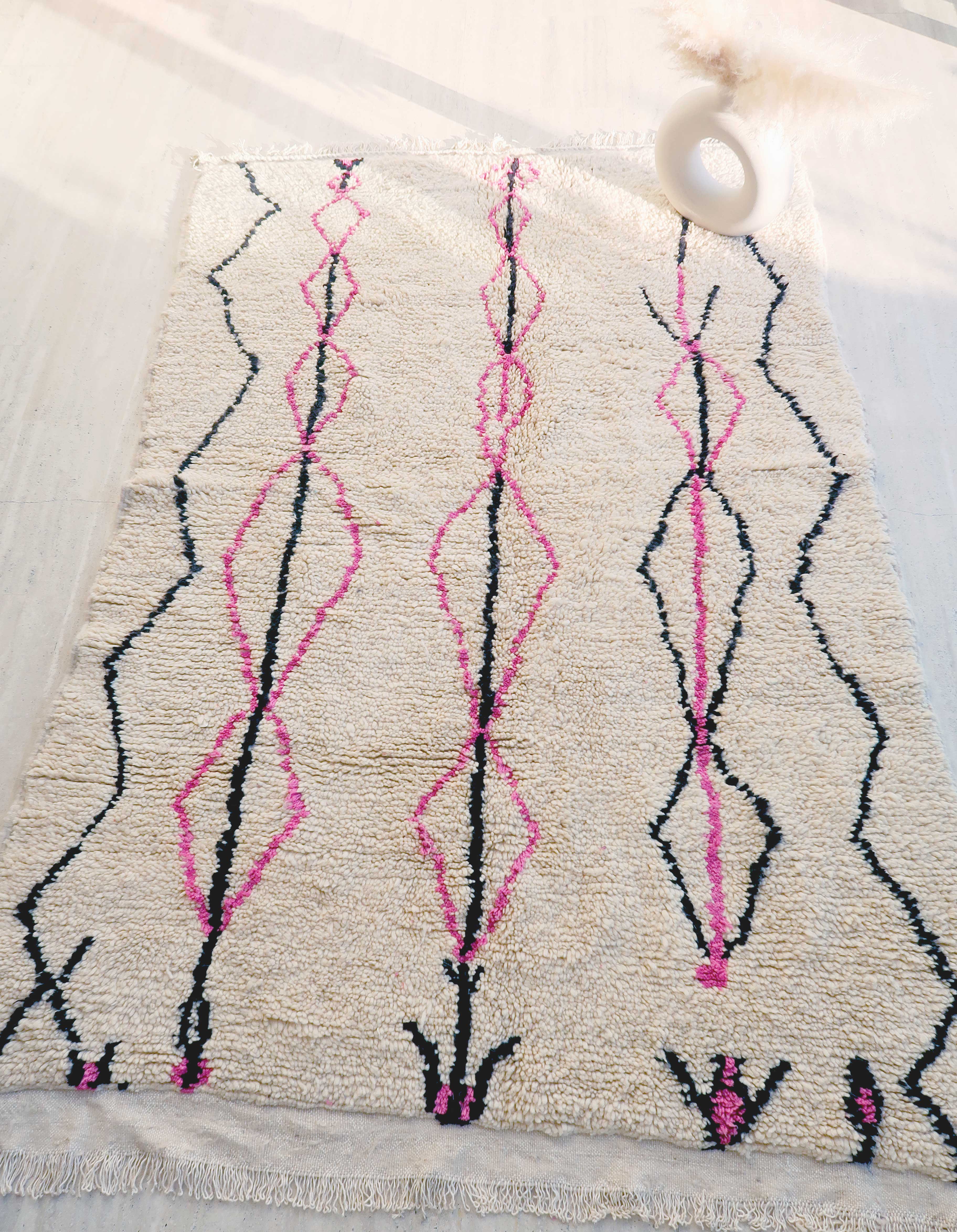 Boujaad Berber rug in pink and black colored wool woven in Morocco 220x140cm