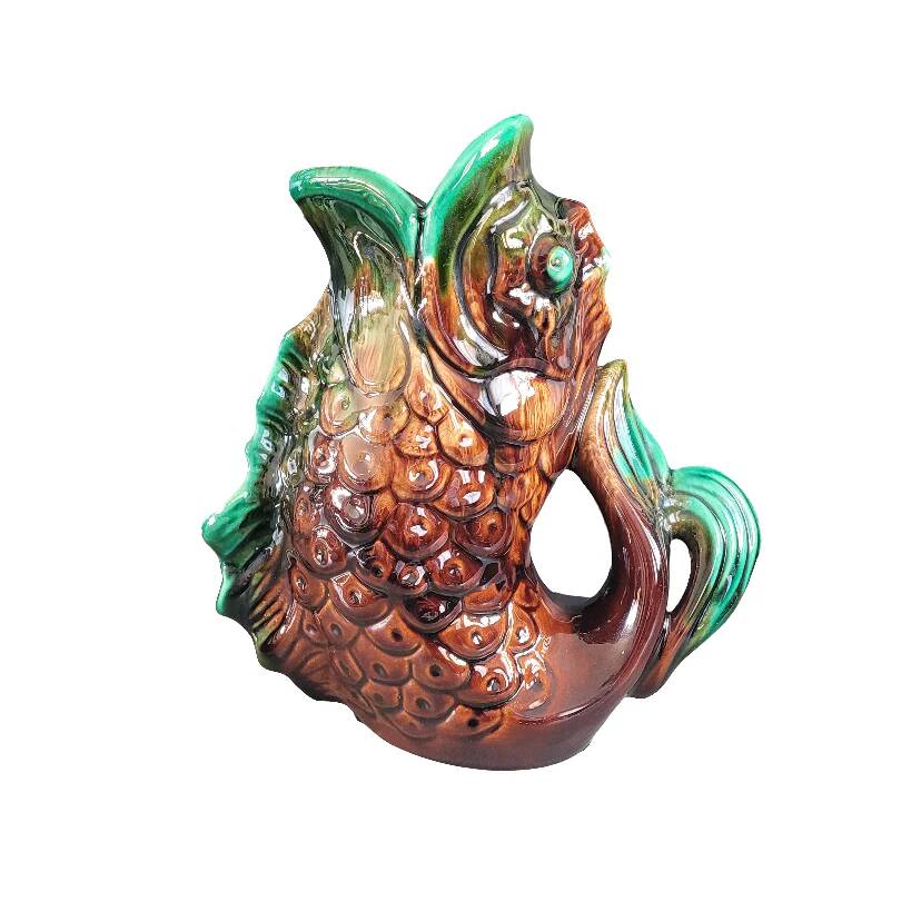 Old ceramic fish jug
