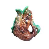 Old ceramic fish jug