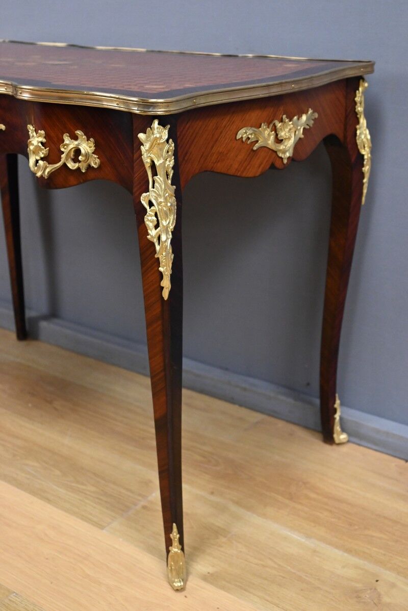 Rosewood, mahogany, and rosewood desk-table, Louis XV style – early 20th century.