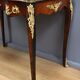 Rosewood, mahogany, and rosewood desk-table, Louis XV style – early 20th century.