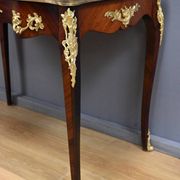 Rosewood, mahogany, and rosewood desk-table, Louis XV style – early 20th century.