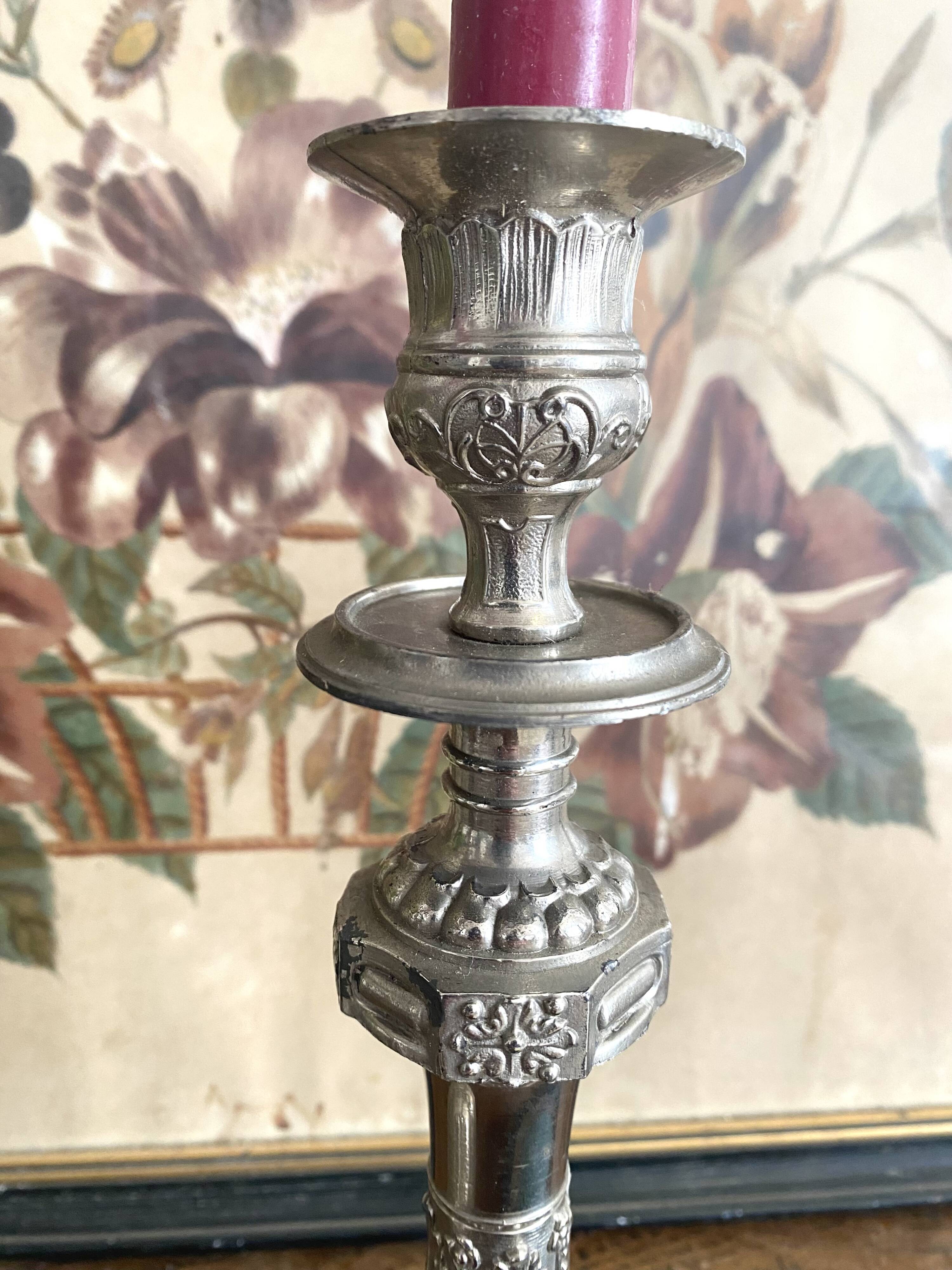 Antique silver-plated metal candlesticks