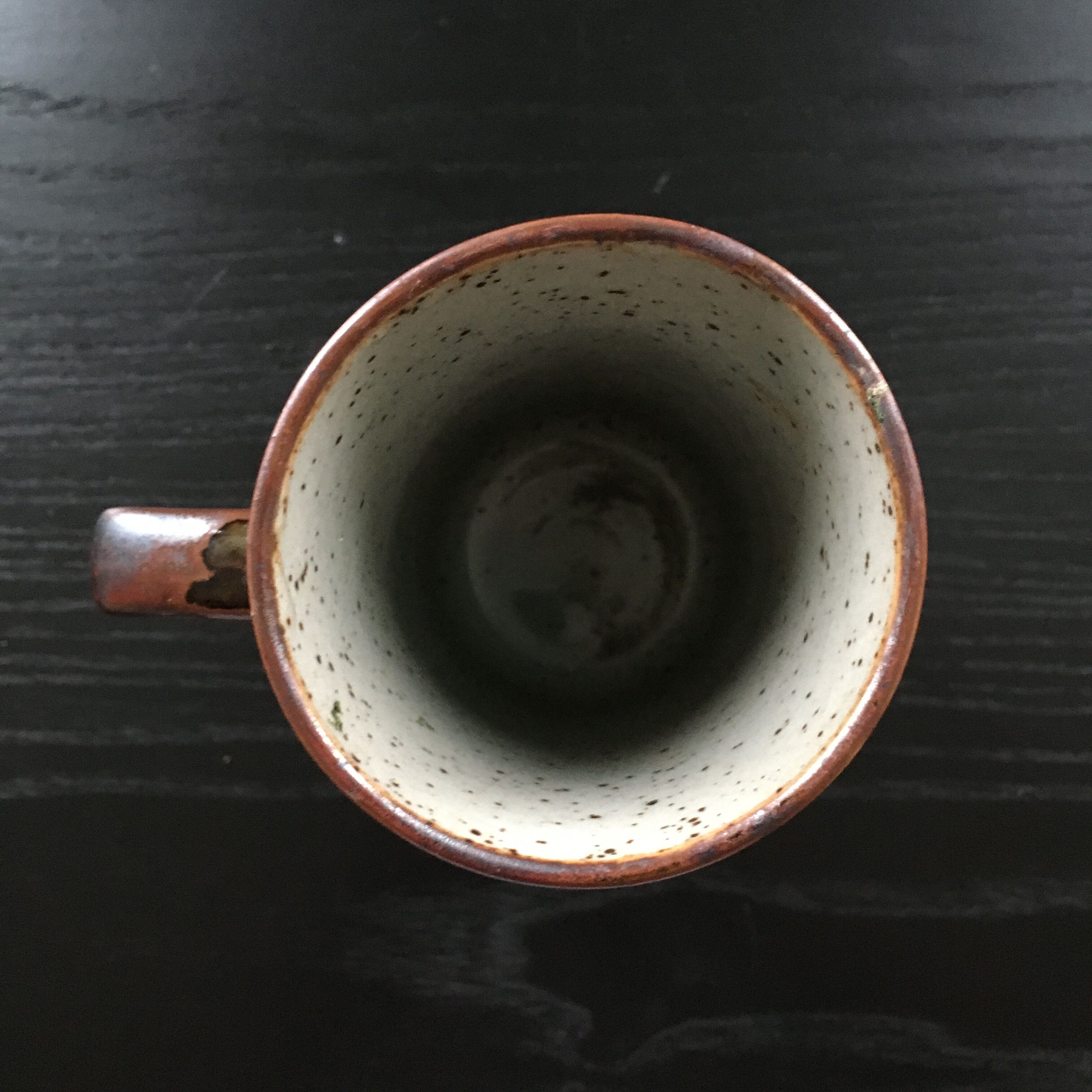 Stoneware mug with floral decoration