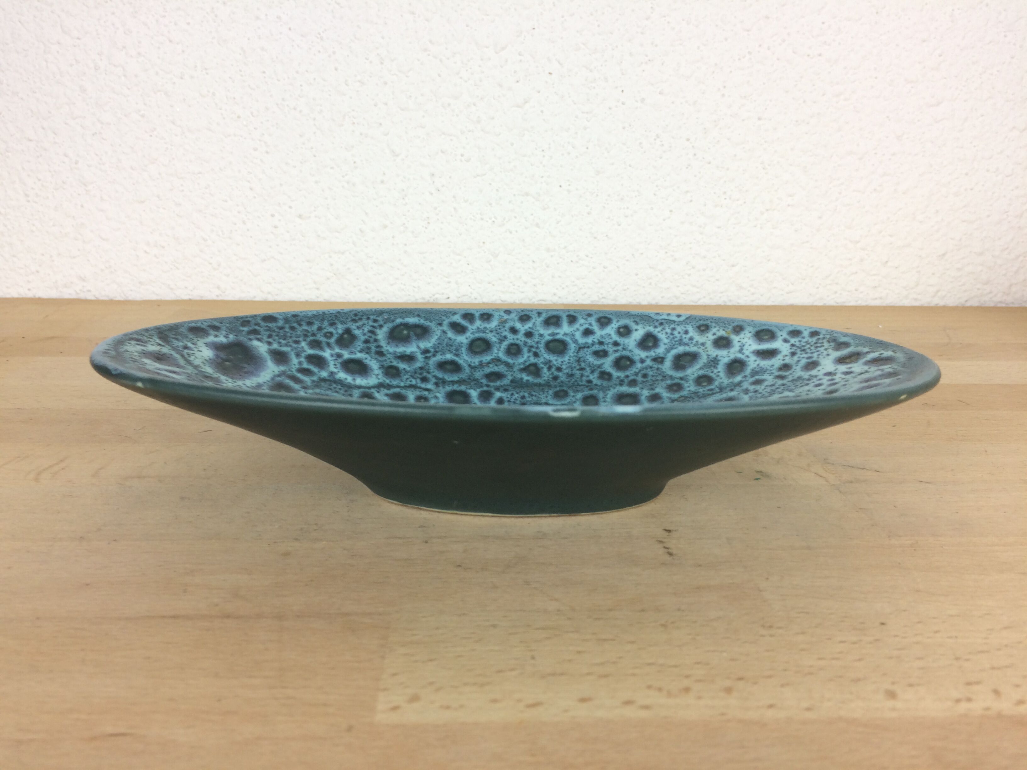 Empty vintage blue ceramic pocket