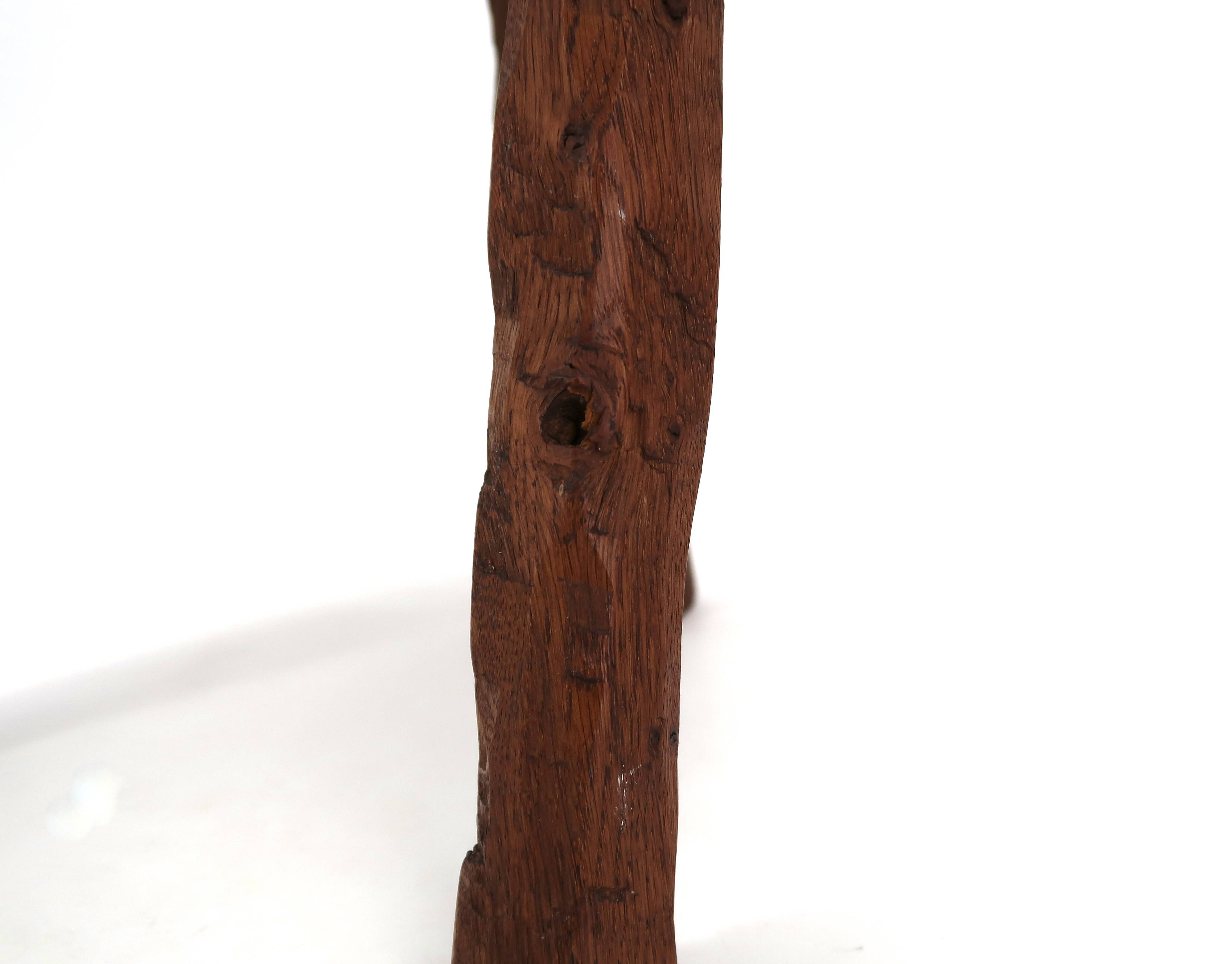 Brutalist tripod stool in wood, 1950s mountain folk art.