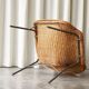 Sculptural lounge chair in rattan and metal, 1960s