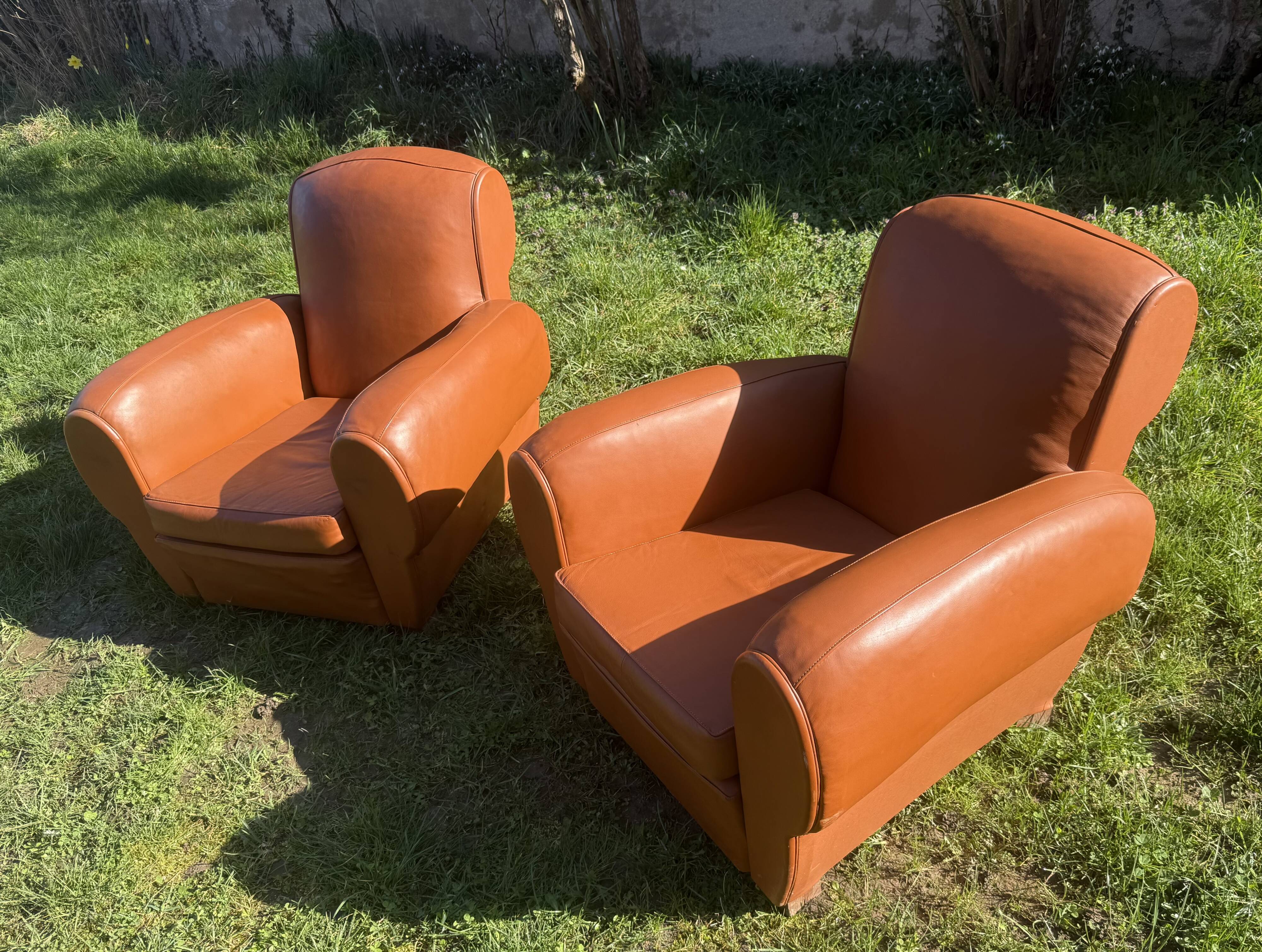 pair of leather clubs