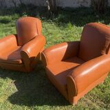 pair of leather clubs