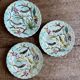 Set of 3 antique plates in majolica with bird designs.