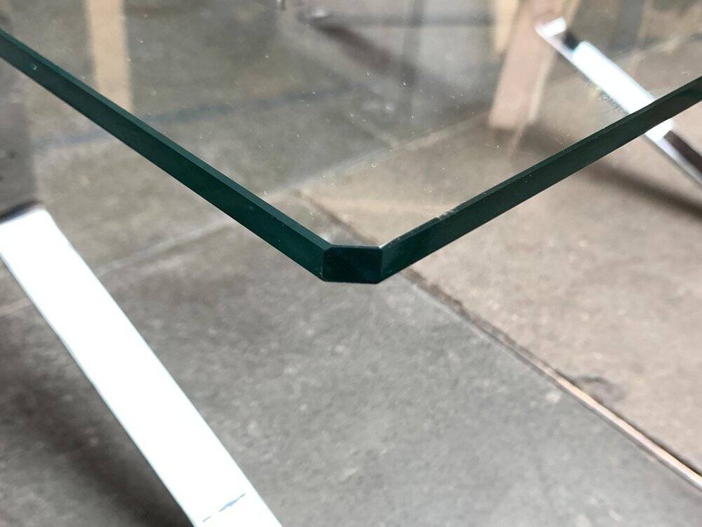 Joker coffee table in chrome and glass in mid-century Space Age style by Olivier Mourgue for Airborne, 1960s.