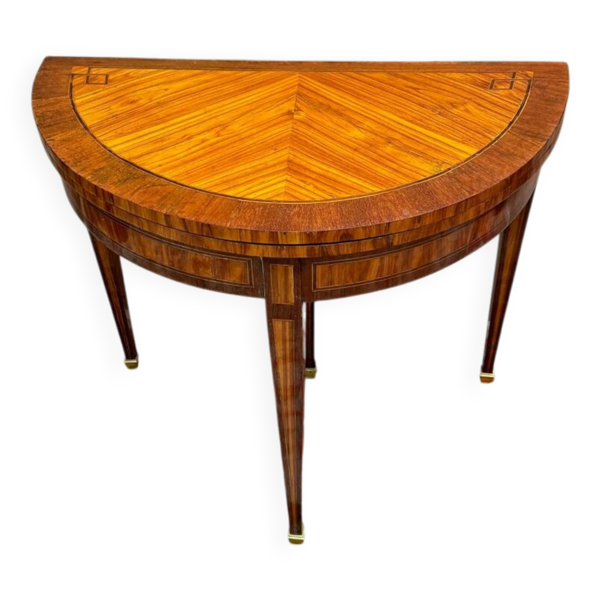 Half-moon game table in marquetry from the Louis XVI period, 18th century.